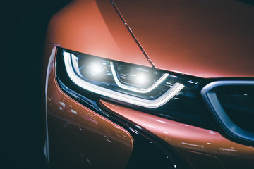 Obraz premium Headlight car Projector/LED of a modern luxury technology