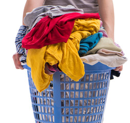 Woman with basket of clothing for laundry