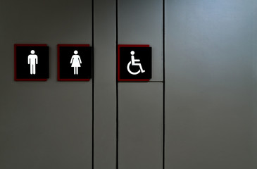 Public toilet sign. Woman, men,and disabled person toilet icon. Public restroom universal icon. Urinary incontinence problem. Male, female ,and disabled access symbol. Latrine or WC. Washroom sign.