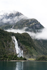 waterfall in Milford Sound, New Zealand