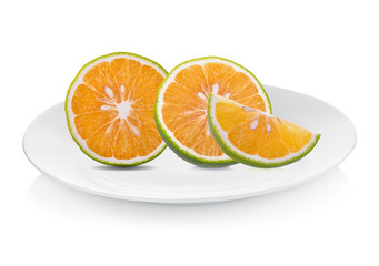 Orange  fruit  isolated on white plate