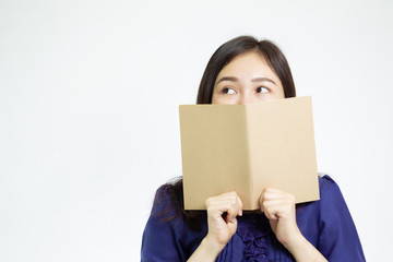 Beautiful pretty Asian woman holding a book close up, with copy space and white background.