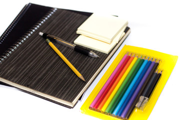 Back to school supplies on white background.