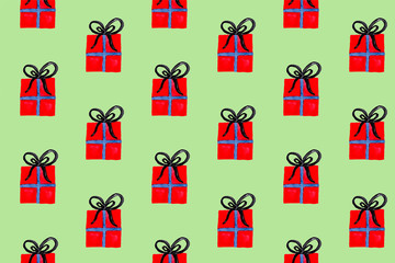 Naklejka premium Seamless watercolor pattern with red wrapped christmas gift boxes. New year festive background. Template for fabric or wrapping paper print. Hand drawn illustration. Christmas decoration objects.
