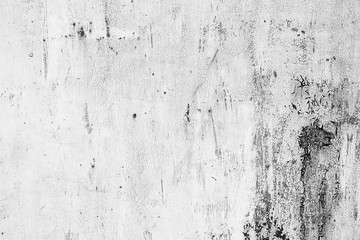 Texture of a concrete wall with cracks and scratches which can be used as a background