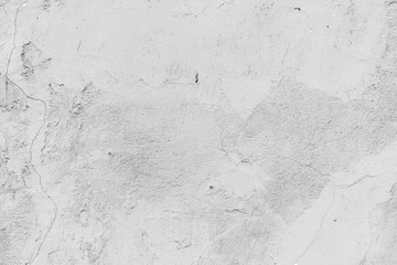 Texture of a concrete wall with cracks and scratches which can be used as a background