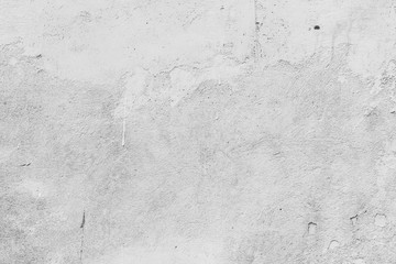 Texture of a concrete wall with cracks and scratches which can be used as a background