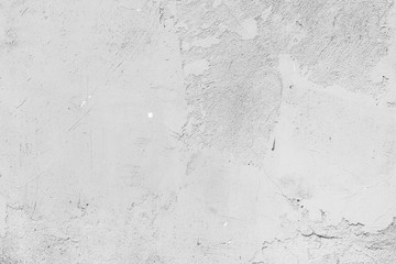 Texture of a concrete wall with cracks and scratches which can be used as a background