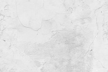 Texture of a concrete wall with cracks and scratches which can be used as a background