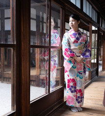 Women Floral Printed Long Kimono in Gion House is an old wooden, traditional style at Gion Shijo Kyoto Japan.