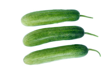 Cucumber and slices isolated over white background