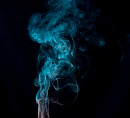 movement of Light blue smoke Abstract on black background.