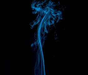 Fototapeta premium movement of Light blue smoke Abstract on black background.