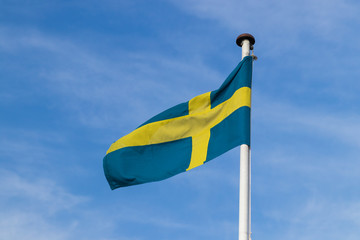 Swedish flag on the ferries going out to the island of Ven in southern Sweden during summer. 