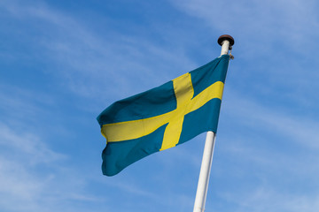 Swedish flag on the ferries going out to the island of Ven in southern Sweden during summer. 