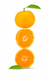 Stack of orange fruits whole and half on white background