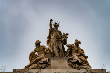 Obraz premium Art, study and peace, statues on the top of Palazzo delle Esposizioni in Rome, Italy