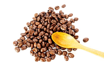 Coffee beans and wooden scoop spoons on a white background