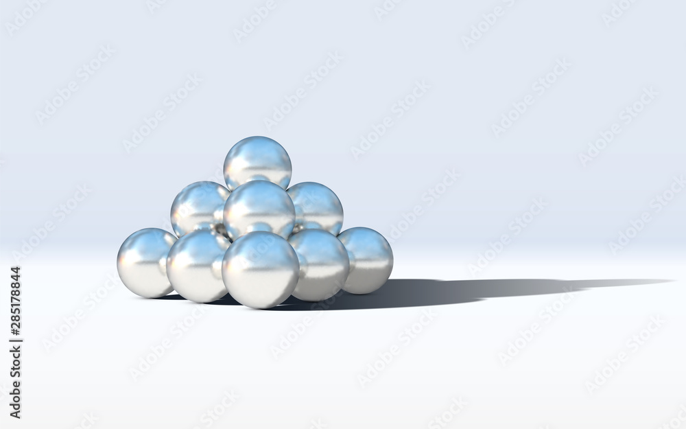 Aufkleber Chrome metal balls in pyramid stack with abstract calm and relaxing background