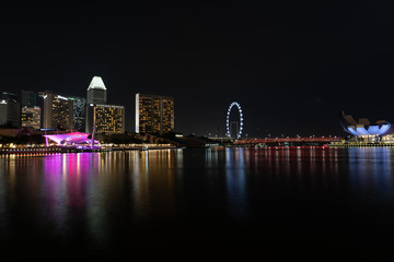 SINGAPORE - MAY 19, 2019: View of the Downtown Singapore skyline and Marina Bay at night.