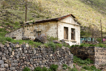 Fototapeta na wymiar Khertvisi village, residential house witn stone fence