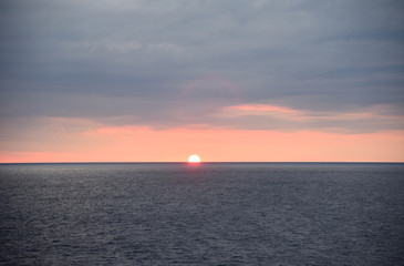 Naklejka na ściany i meble Beautiful sunrise over the Atlantic Ocean. 