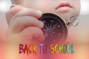  compass in baby's hand