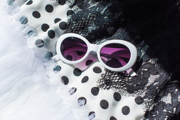 Black and white glasses and cloth with lace polka dot