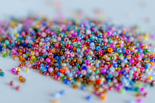 Mix of colorful seed beads, texture background