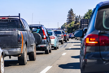 Fototapeta na wymiar Heavy traffic on one of the freeways crossing Silicon Valley, San Francisco bay area, California