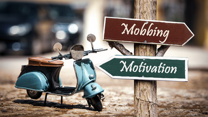 Street Sign to Motivation versus Mobbing