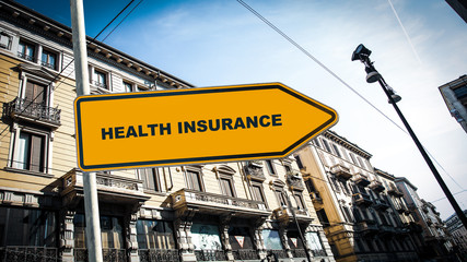Obraz premium Street Sign to Health Insurance