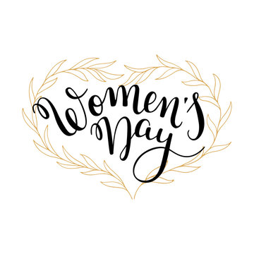Hand lettering Women's Day and leaves heart wreath