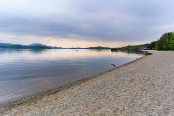 Beautiful Loch Lomond in The Trossachs National Park in the evening in summer , Luss , Scotland