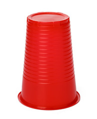 Colored plastic cups isolated on white background