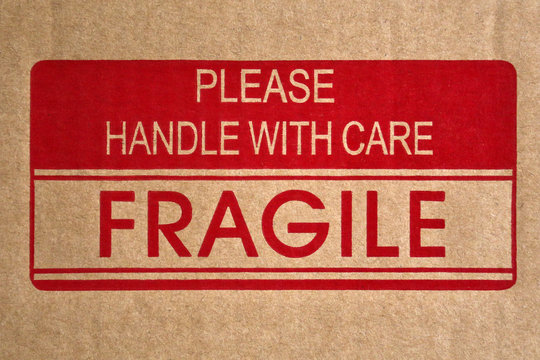 Fragile message on shipping box