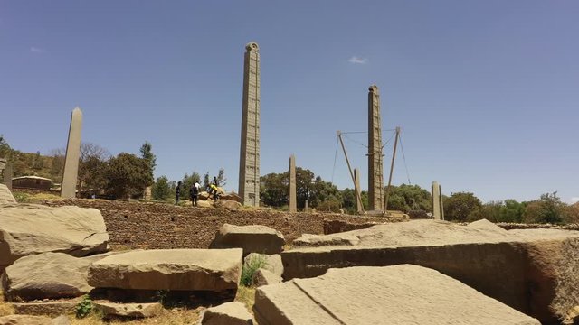 Low angle drone flight of famous obelisk structure dating from Kingdom of Aksum (located in today's city of Axum) in Northern Ethiopia