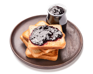 Plate with tasty toasted bread and jam on white background