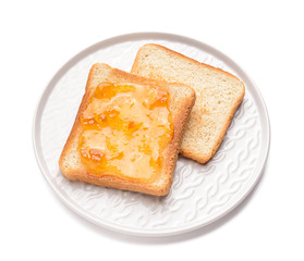 Plate with tasty toasted bread and jam on white background