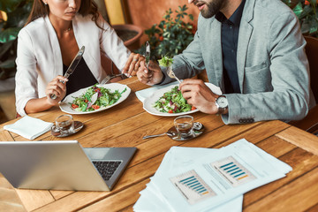 Casual atmosphere. Businesspeople have a meeting during lunch break