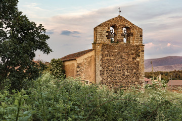 Fototapeta na wymiar Church of San Pedro in Alquite, red village of the Riaza region province of Segovia. XII century (Spain)