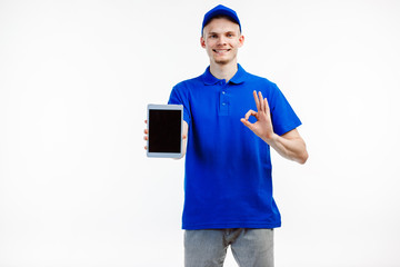 Delivery guy turns tablet screen towards the camera.