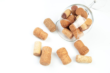Wine corks in glass isolated on white background. Focus on wine corks - Image