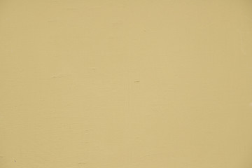 Empty beige painted textured wall