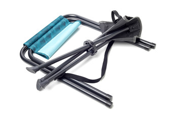 Folding camping stool on white background