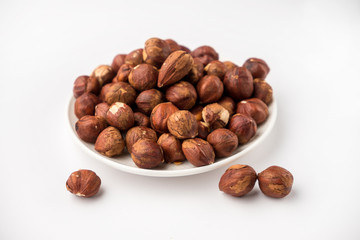 nutritious nuts, hazelnuts on a white background