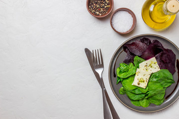 Beetroot, spinach and cheese salad. Healthy eating. Vegetarian food.