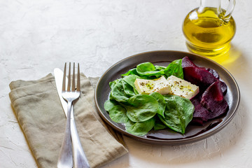 Beetroot, spinach and cheese salad. Healthy eating. Vegetarian food.