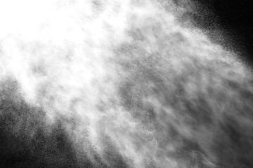 A stream of water and a cloud of drops