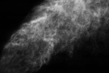 A stream of water and a cloud of drops